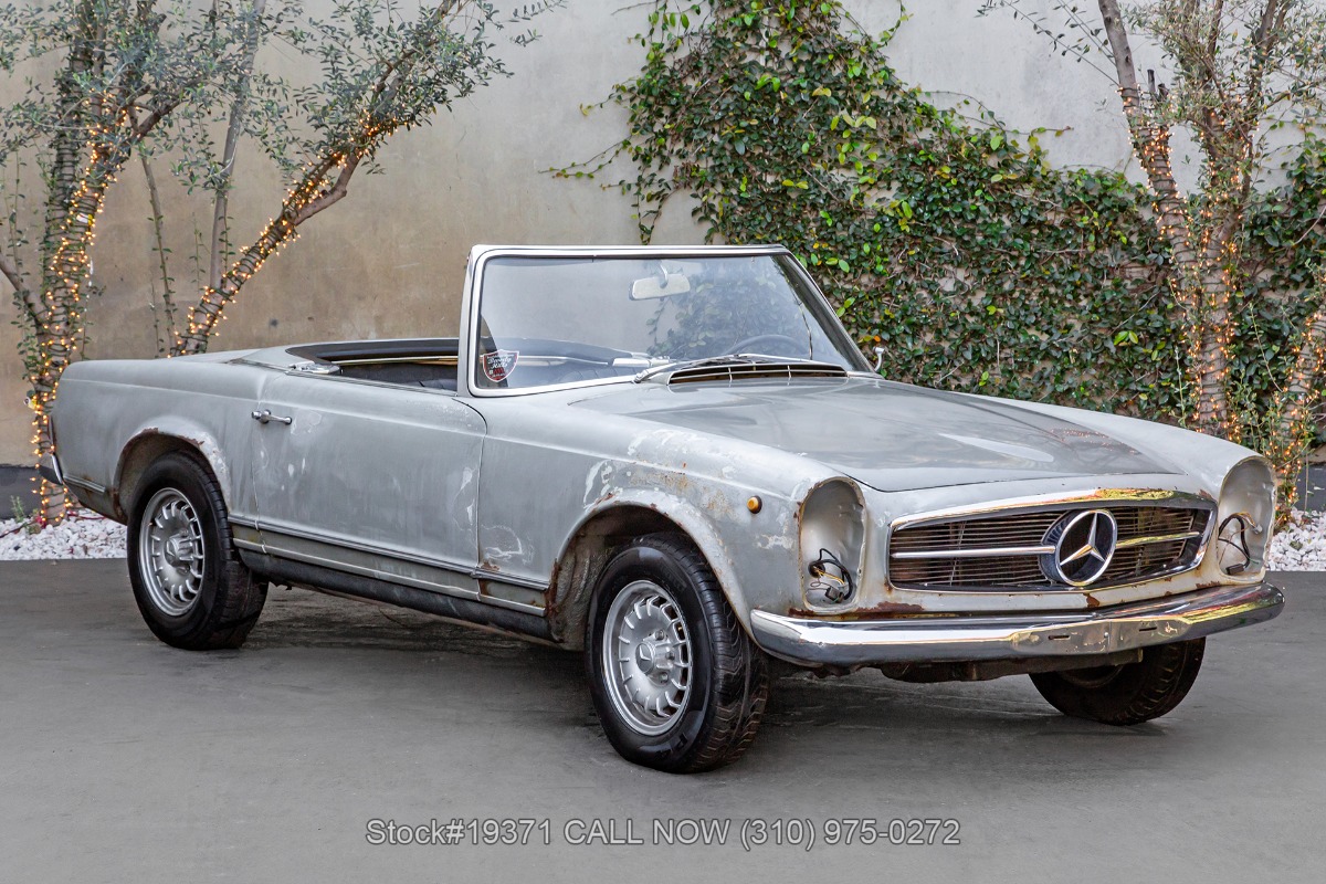 1965 Mercedes-Benz 230SL with 2 tops